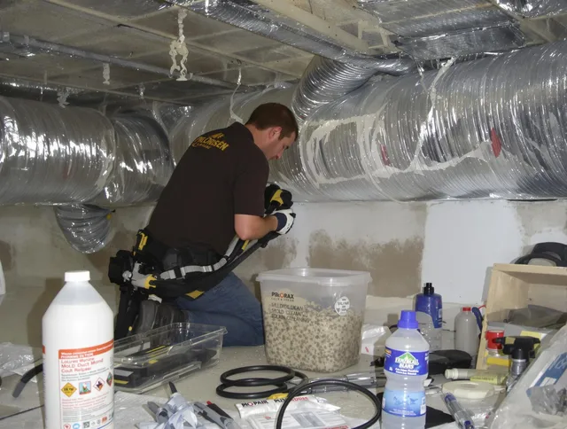 Sudbury Air Duct Cleaning specialist performing professional mold removal from air ducts in Sudbury