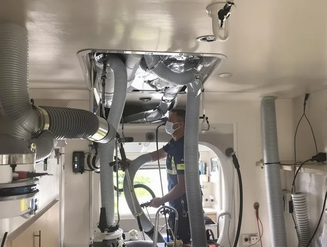Sudbury Air Duct Cleaning specialist performing precise mobile home duct cleaning in Sudbury