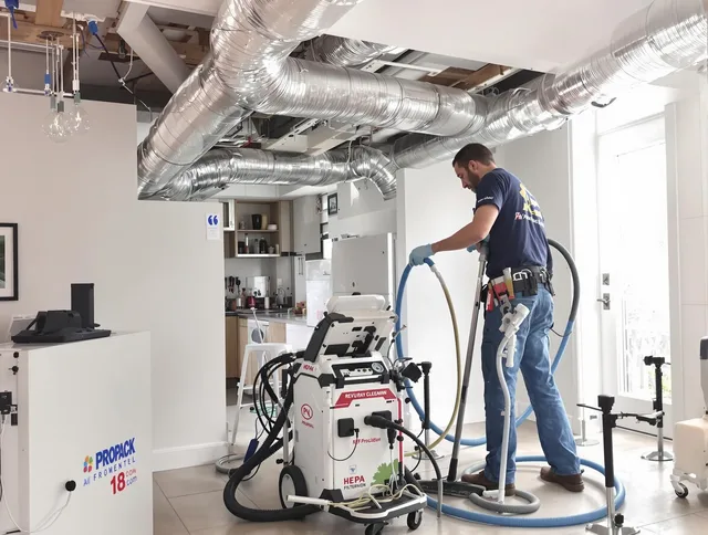 Sudbury Air Duct Cleaning technician performing advanced pure duct cleaning with specialized equipment in Sudbury